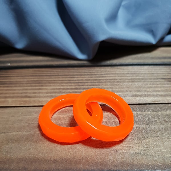 حلقه رزینی طرح دار نارنجی فسفری1