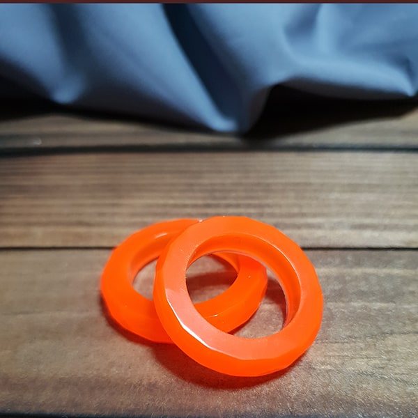 حلقه رزینی طرح دار نارنجی فسفری